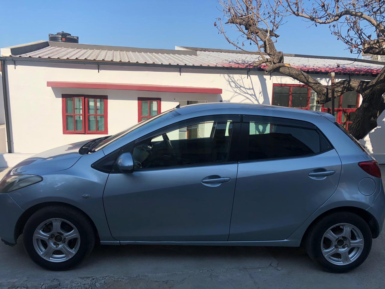 
								Mazda Demio 2010 cheio									