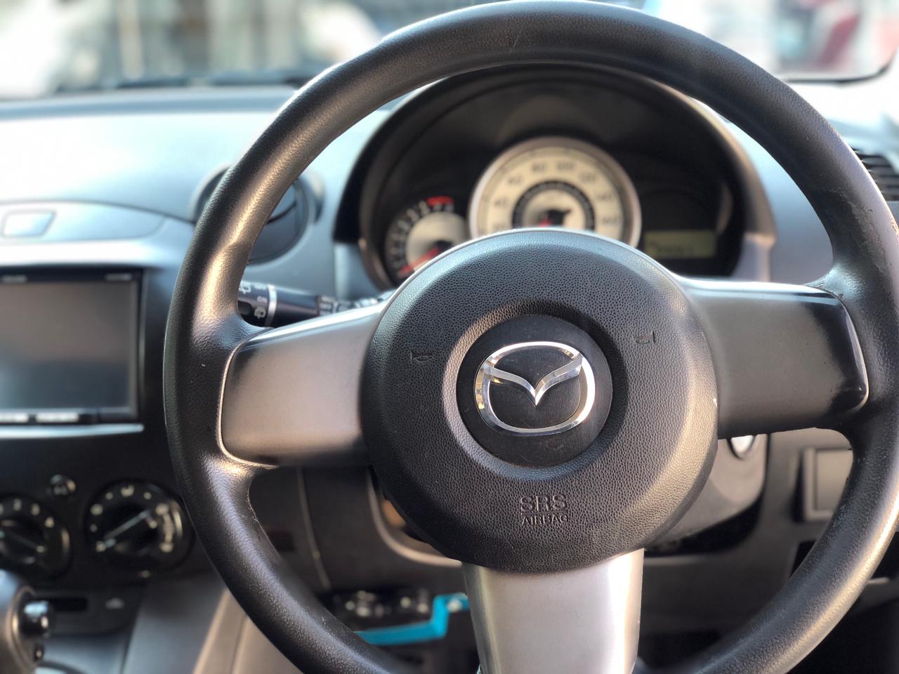 
								Mazda Demio 2010 cheio									